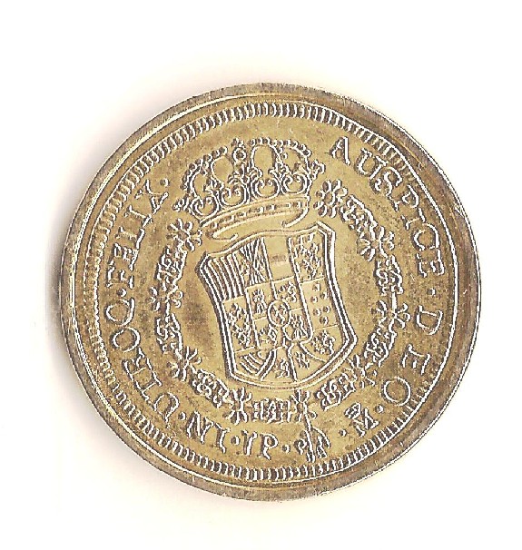 Foto 2 Moneta non identificata: Moneda de españa, no se si es falsa