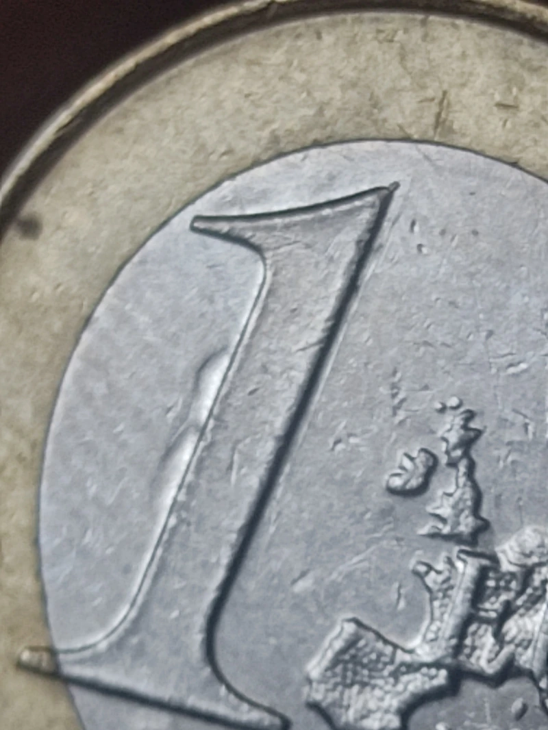 Foto 2 Moneta non identificata: Moneda de un euro de España 2023 ¿Error de acuñación?