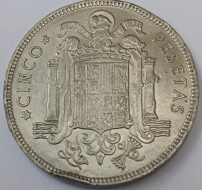 Foto 2 Moneta non identificata: 5 pesetas 1949 estrella 49/50 níquel