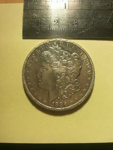 Foto 2 Moneta non identificata: alguien podria tasar esta moneda ??
